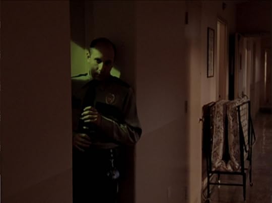 Security guard lurking creepily in the hallway like some kind of weird pervert.