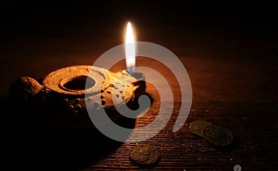 middle-east-oil-lamp-old-coins-burning-clay-wooden-table-55276983