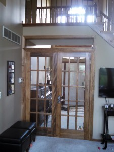 French doors separating the foyer with the two stairs ways that lead to the upper and lower levels. Another piece-of-mind addition that helps keep Matthew out of mischief. I am looking forward to making a stained glass insert for the transom space above the doors...a custom solution to an over-sized opening.