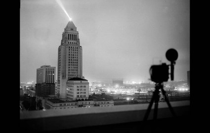 May 7, 1952: View of Los Angeles City Hall lite up at 5:15 a.m. as A-Bomb is exploded in Yucca Flat, Nevada, some 300 miles away. This photo was published in the May 8, 1952 Los Angeles Times. The Lindbergh Beacon projects the ray of light from a top City Hall.