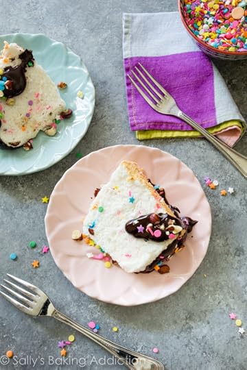 Rainbow sprinkles, crunchy hazelnuts, and smooth chocolate ganache makes this fluffy angel food cake a huge party!