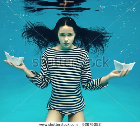 stock-photo-girl-with-two-paper-boats-92679052