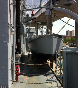 Whaleboat hanging on its davits, USS Joseph P. Kennedy, Jr., Battleship Cove, Fall River, MA, July 2014 (Photo: Sarah Sundin)