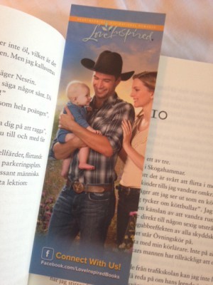 Den har förärats ett av mina RWA-bokmärken. Är det inte ett fantastiskt bokmärke? Only in America, huh?