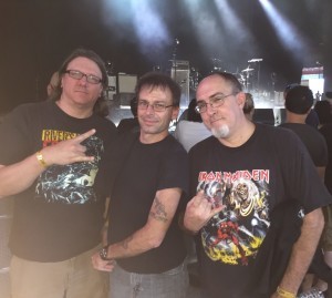 Three old men at a metal show.