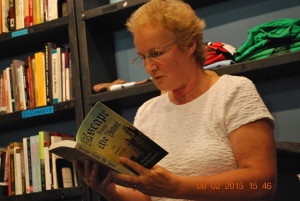 woman reading from a book