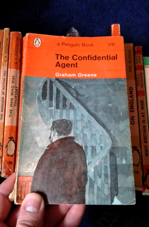 The Confidential Agent by Graham Greene; Penguin Paperback (1895); 1963 edition; cover by Paul Hogarth