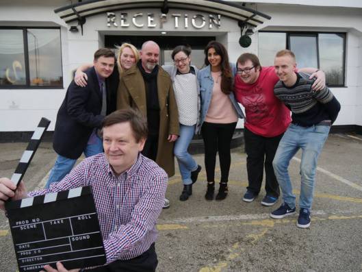 Some of the team gathered outside the hotel for a newspaper photoshoot.