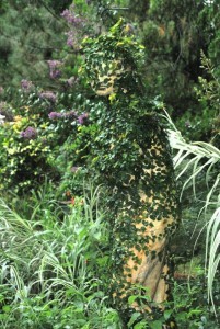 garden statue with ivy