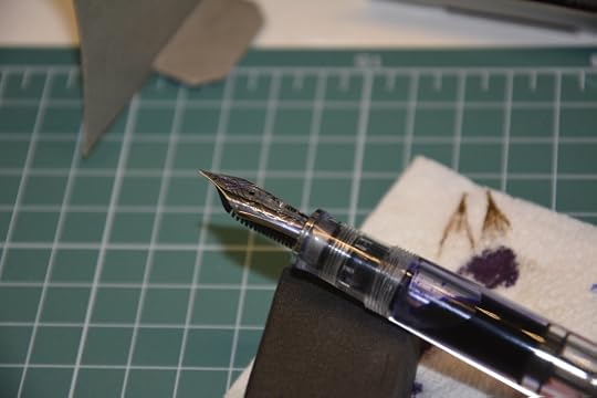 Love the see through body and silvered nib. Just lovely!