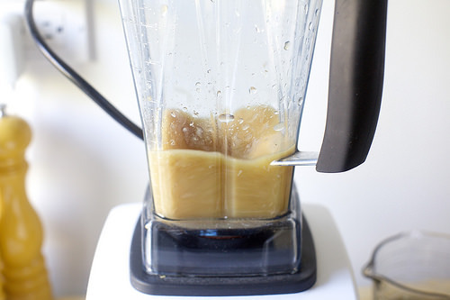 blending golden raspberries