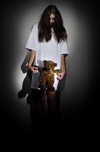 Girl with teddy bear