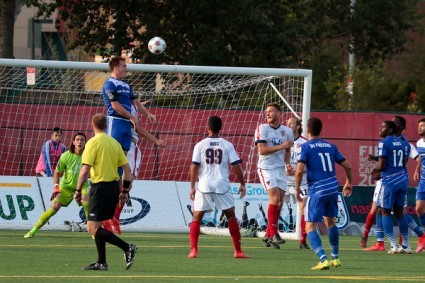 Albert Watson leaps to score FC Edmonton's first goal. PHOTO: TONY LEWIS/FC EDMONTON