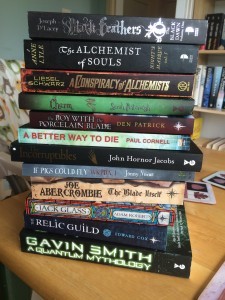 Photo of 12 books that we bought back from Nine Worlds