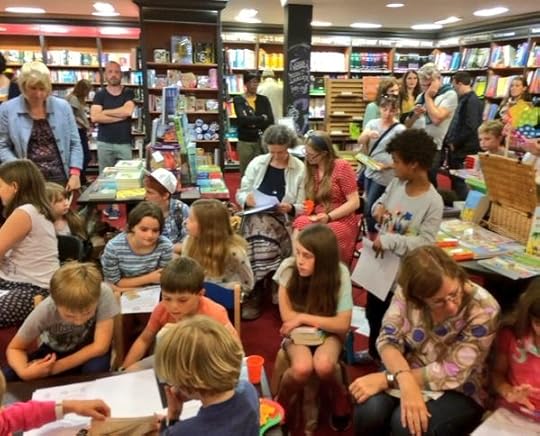 Working on activity sheets at the First Class Murder launch