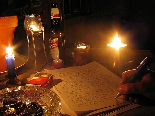 Artikel-im-kerzenshein - A person writing by candlelight - from Wikimedia Commons