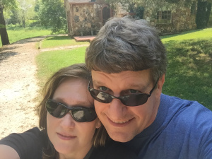 I was joined by my significant other, who graciously indulged my Laura time and listened to me talk about the books for hours on end. We're standing in front of the Rock House that Rose built. She ordered the plans from a Sears catalogue. 