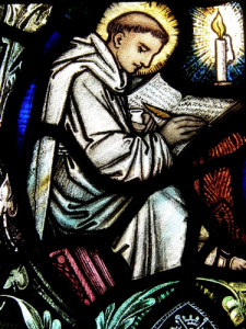 Monk in Stained Glass (Panaspics/Shutterstock)