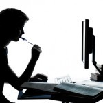 one young teenager boy girl silhouette studying with computer c