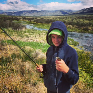 Tom holding his first trout on a dry fly. 