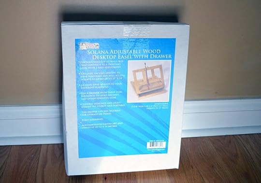 The packaging for Solana Adjustable Wood Desk Easel with Drawers.