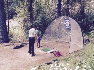 Grampa Dave giving grandson, Brandon, a golf lesson!