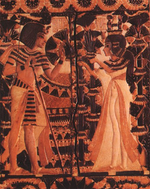 Tutankhamun receives flowers from Ankhesenamun as a sign of love. copyright Wikipedia