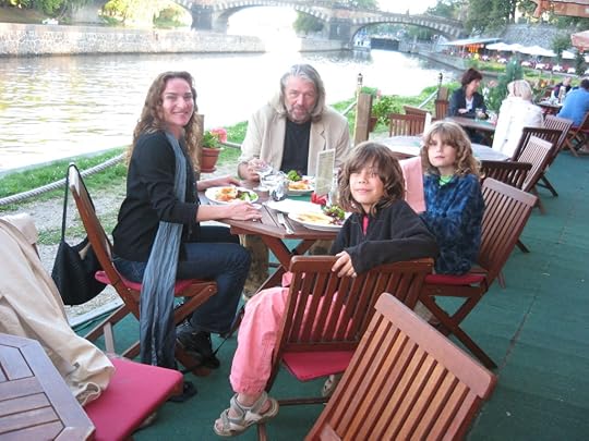 Enjoying lunch along in Prague along the Moldau. (check the light spot above Honza head)