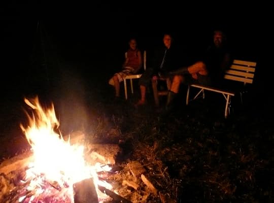 Hours and hours we talked around the pile of flames.