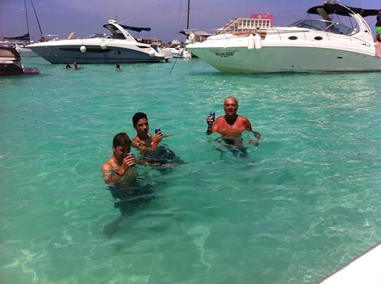 At Isla Mujeres enjoying a beer in crystal clear Caribean waters.
