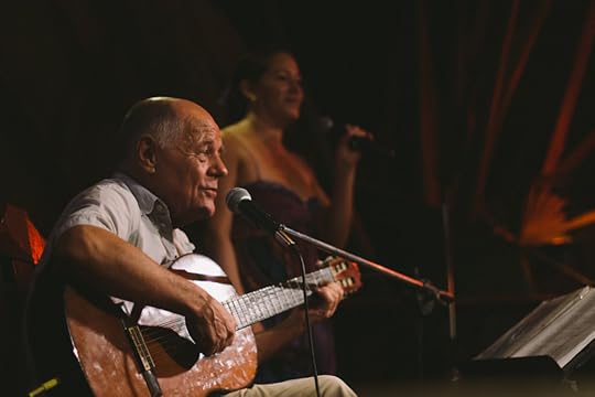 Ted Rhodes and in the background Victoria Carpio singing a duet.