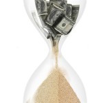 hourglass with dollar inside (time is money concept)