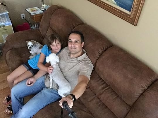 A quick selfie with one of my daughters and a few of our pets.