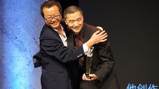 Liu Cixin (L), author of