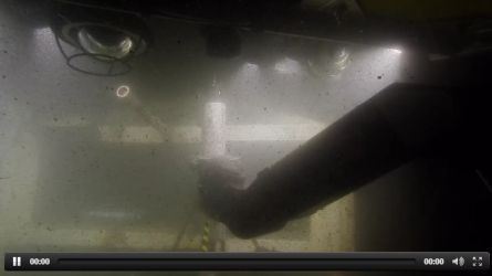 Plugging in new instruments. Notice the sediment in the water.
