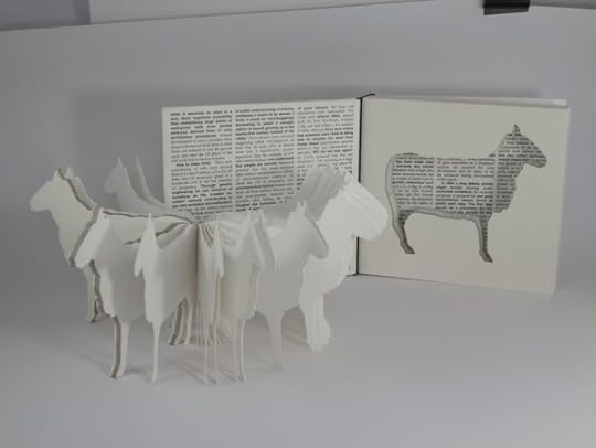 Multiple cut-outs of the cloned sheep Dolly are included in this limited edition book that features the original article about the cloning in the journal Nature. Copyright Karen Bleitz