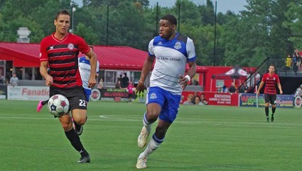 FC Edmonton's Kareem Moses, right, tries to shadow Atlanta's Pedro Mendes. PHOTO: ATLANTA SILVERBACKS