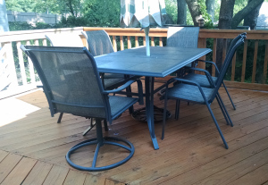 My almost-completed deck staining/sealing project. Sloppy for a beginner but at least it's good enough.