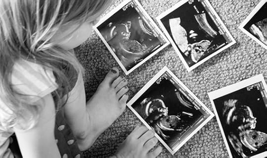 Child viewing ultrasounds