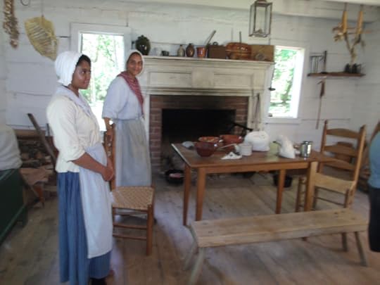 This picture is inside the McConnell house at Brattonsville and features re-enactors that live the 1780's life daily. Taken on my research trip for my in-process novel, 