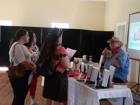 Talking to attendees at the Blue Ridge Bookfest. Test your ideas on your readers at every opportunity. 