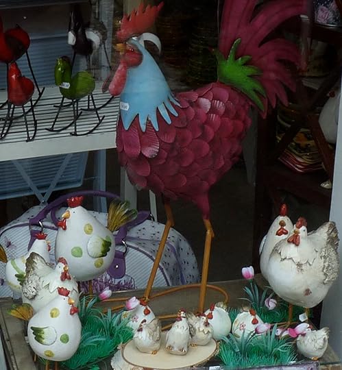 Charmant! Rooster, hens and chicks made of metal, outside a gift shop in Provence. 