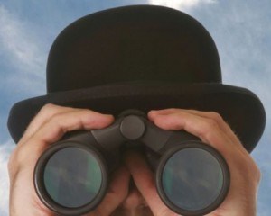 Looking-through-binoculars-300x240