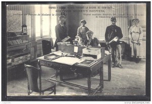 Katherine Harley sits at the desk