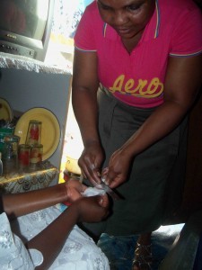 Clara scraping a mothball