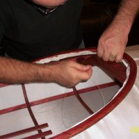 Detail of lashing a coaming onto the skin of a Greenland kayak