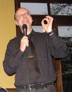 Mr. V's friend, Rob Sawyer, reads from one of his books at Bakka Phoenix