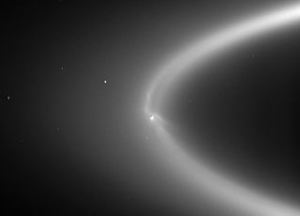 Enceladus orbits i Saturn's E Ring - it's water geysers may have created the ring. NASA/JPL/Space Science Institute PIA08321