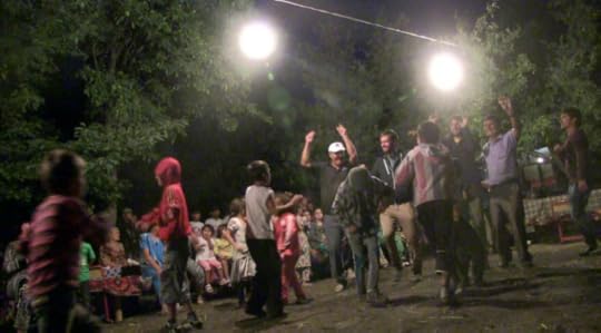Caption: In earshot of Afghanistan, but nobody’s turning down the music. A well-placed hello lands us in a Tajik village party. Global Goulets 