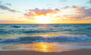 Sunrise over the ocean in Miami Beach, Florida. Spring sunrise at the empty beach.